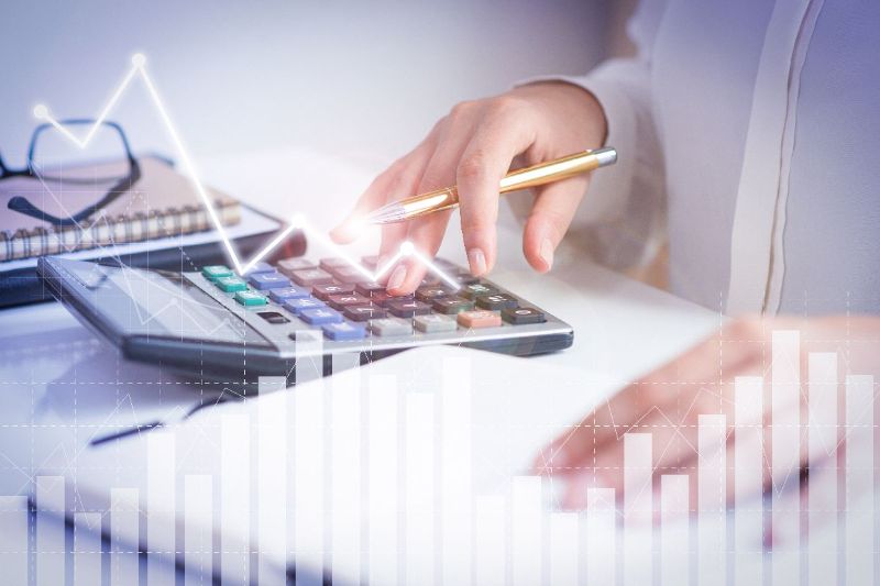 accountant-calculating-profit-with-financial-analysis-graphs(1).jpg